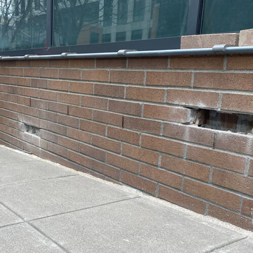 Restoration of Concrete and Brick Facade